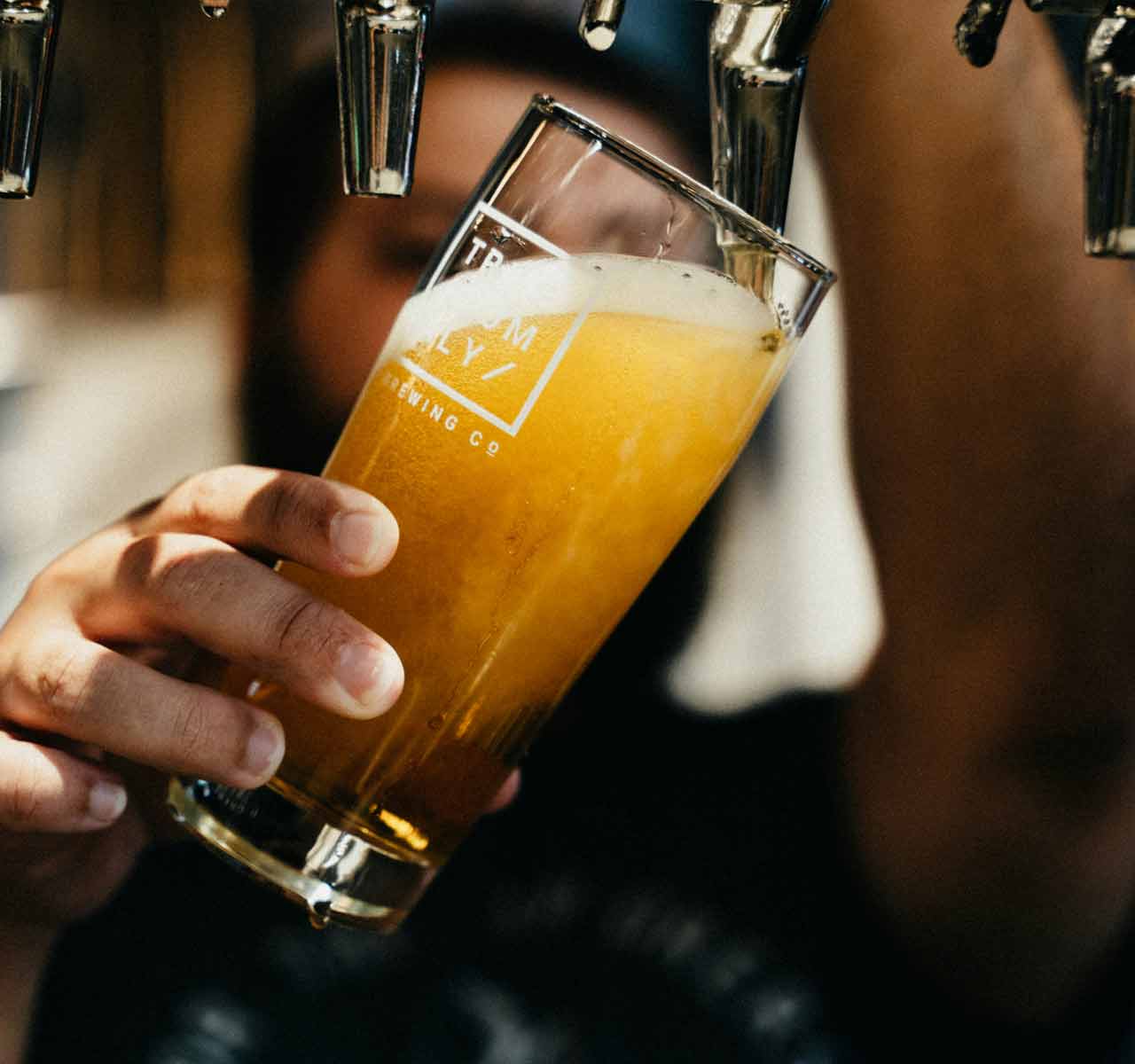 Barman pulling a pint of beer for mobile bar north-east in Hurworth-on-Tees, Darlingon