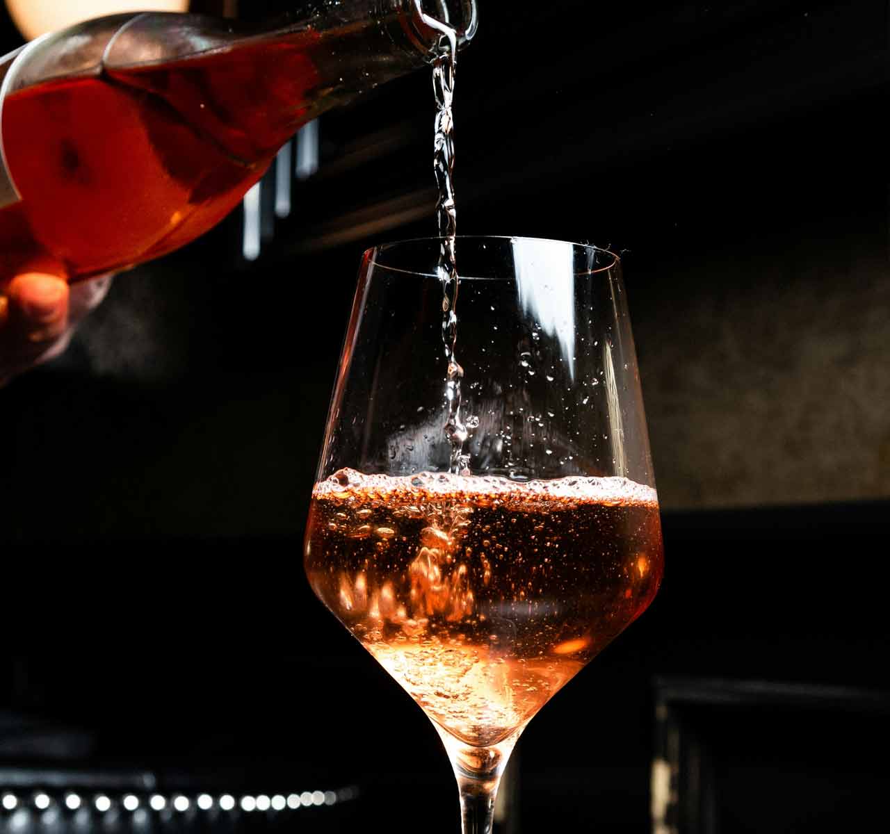 Table wine being poured by Mobile Bar staff at a wedding in Bedale, North Yorkshire